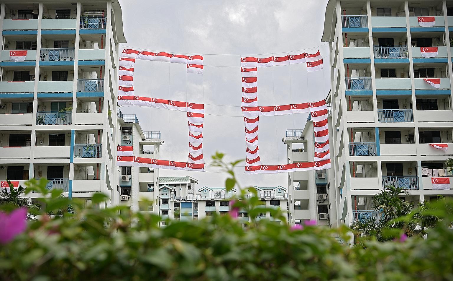 Eye-catching flag displays have been going up in various neighbourhoods across Singapore in the lead-up to National Day on Aug 9. In this estate in Toa Payoh Lorong 1, a large display of flags making up the number 56 hangs between two blocks of flats