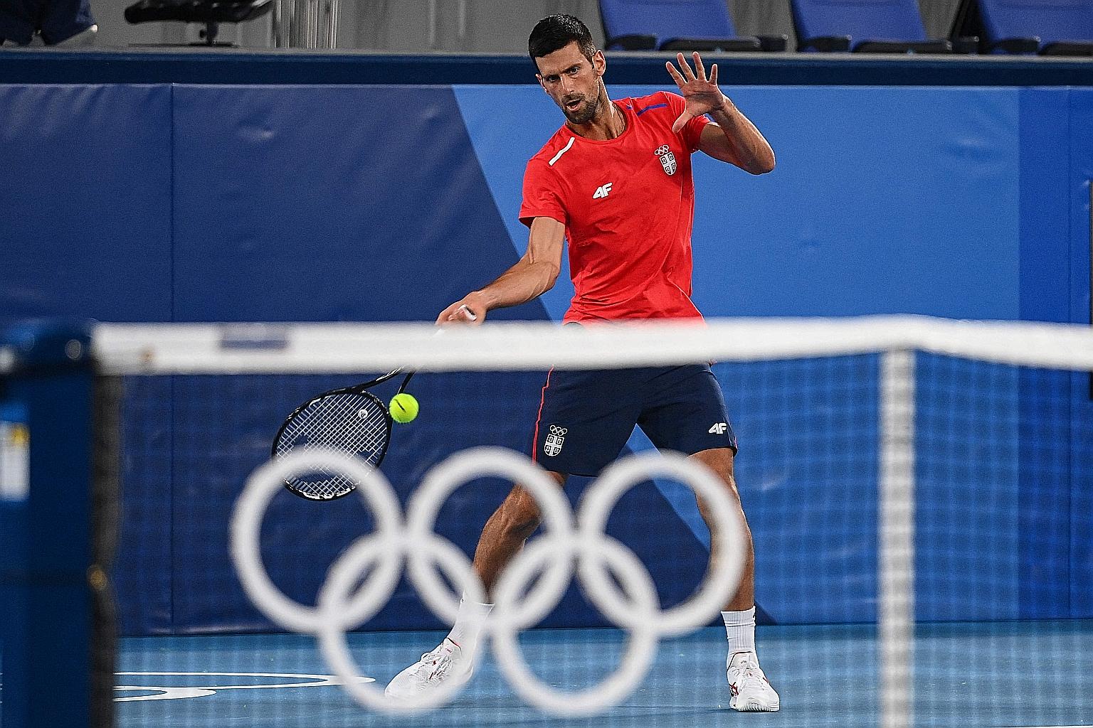 Serbia's world No. 1 Novak Djokovic at a training session at the Ariake Tennis Park ahead of his first-round match against Bolivia's Hugo Dellien today.