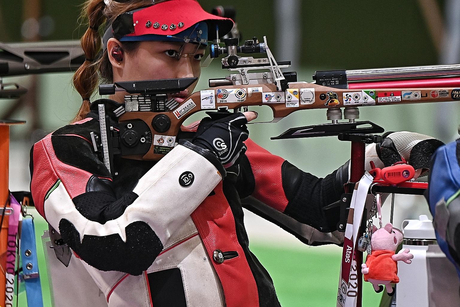 Singapore's Adele Tan took some time to compose herself before her first shot in the 10m air rifle but she finished a creditable 21st.
