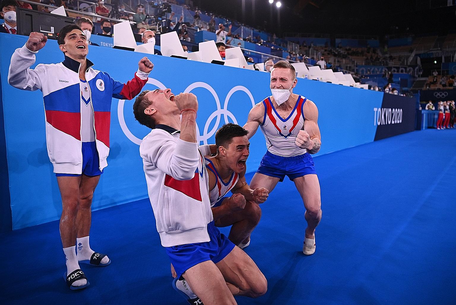 Nikita Nagornyy (third from left) delivered a pressure-packed floor routine to secure victory for his team by just 0.103 of a point over Japan.