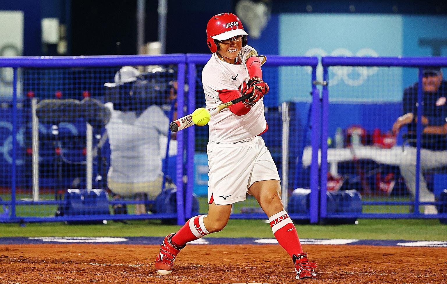Yamato Fujita hitting to drive in their second run in the game against the US. Japan won 2-0.