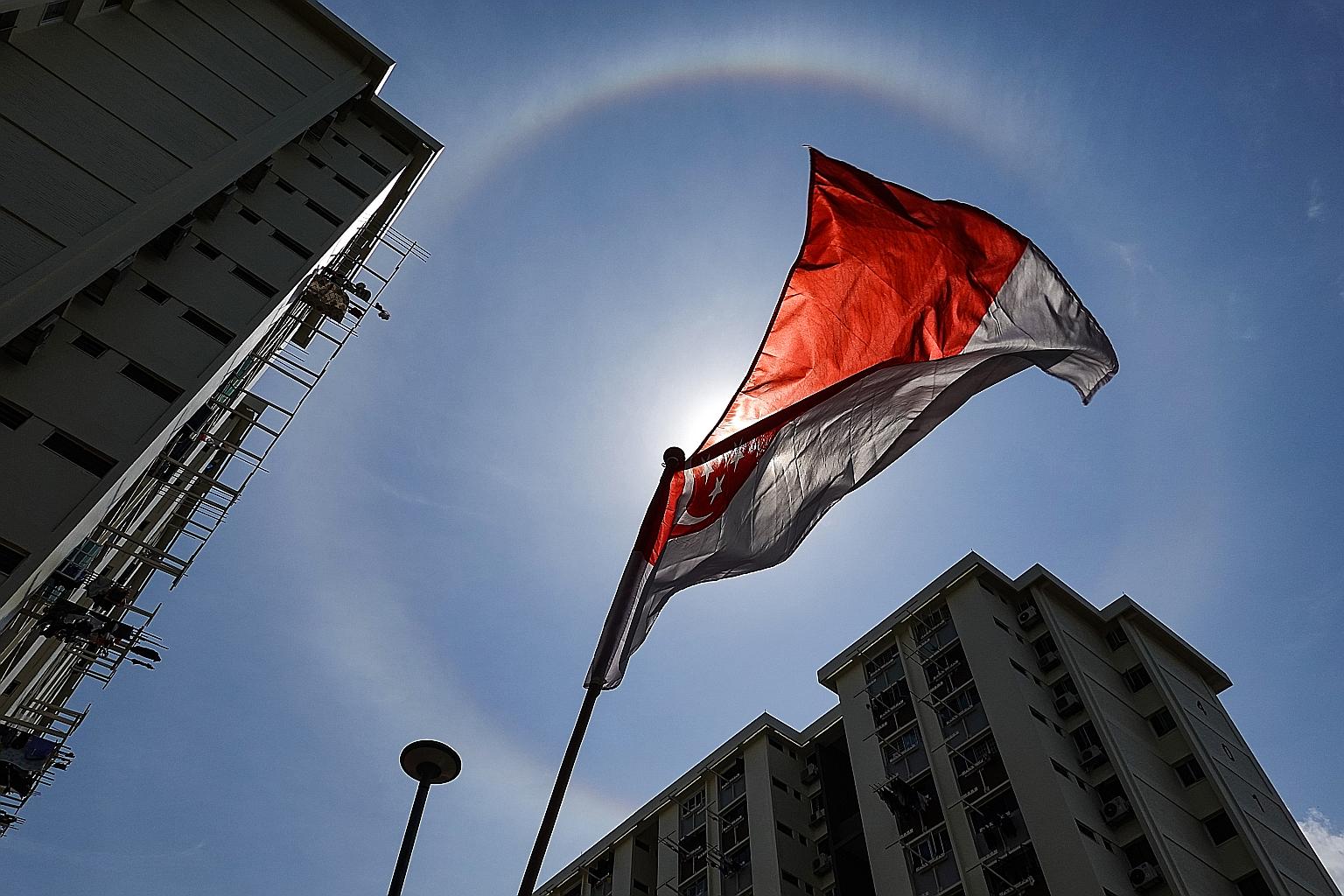 Many people in eastern Singapore were treated to the sight of a sun halo yesterday. The ring around the sun was spotted at noon on another baking hot day. Sun halos are typically seen when thin clouds of small ice crystals high up in the sky play wit