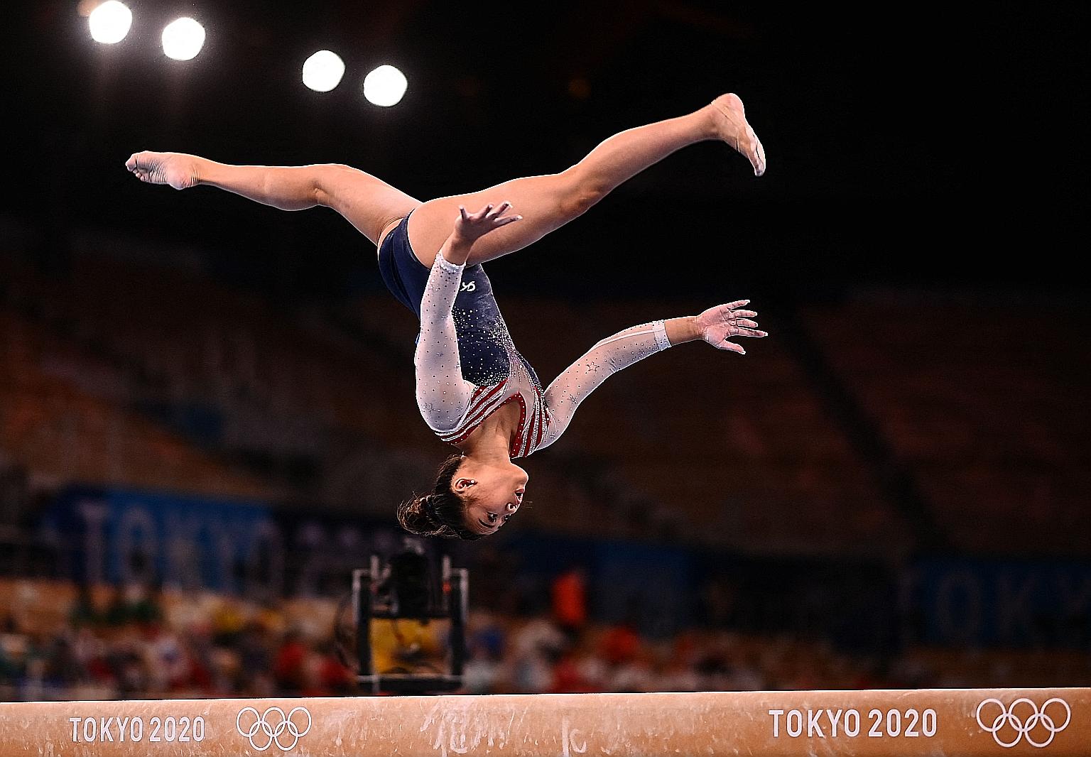 United States' Sunisa Lee scoring 13.833 points on the balance beam en route to winning the all-around gold yesterday with her total score of 57.433. Her win means that US gymnasts have won the event for five consecutive Olympics.