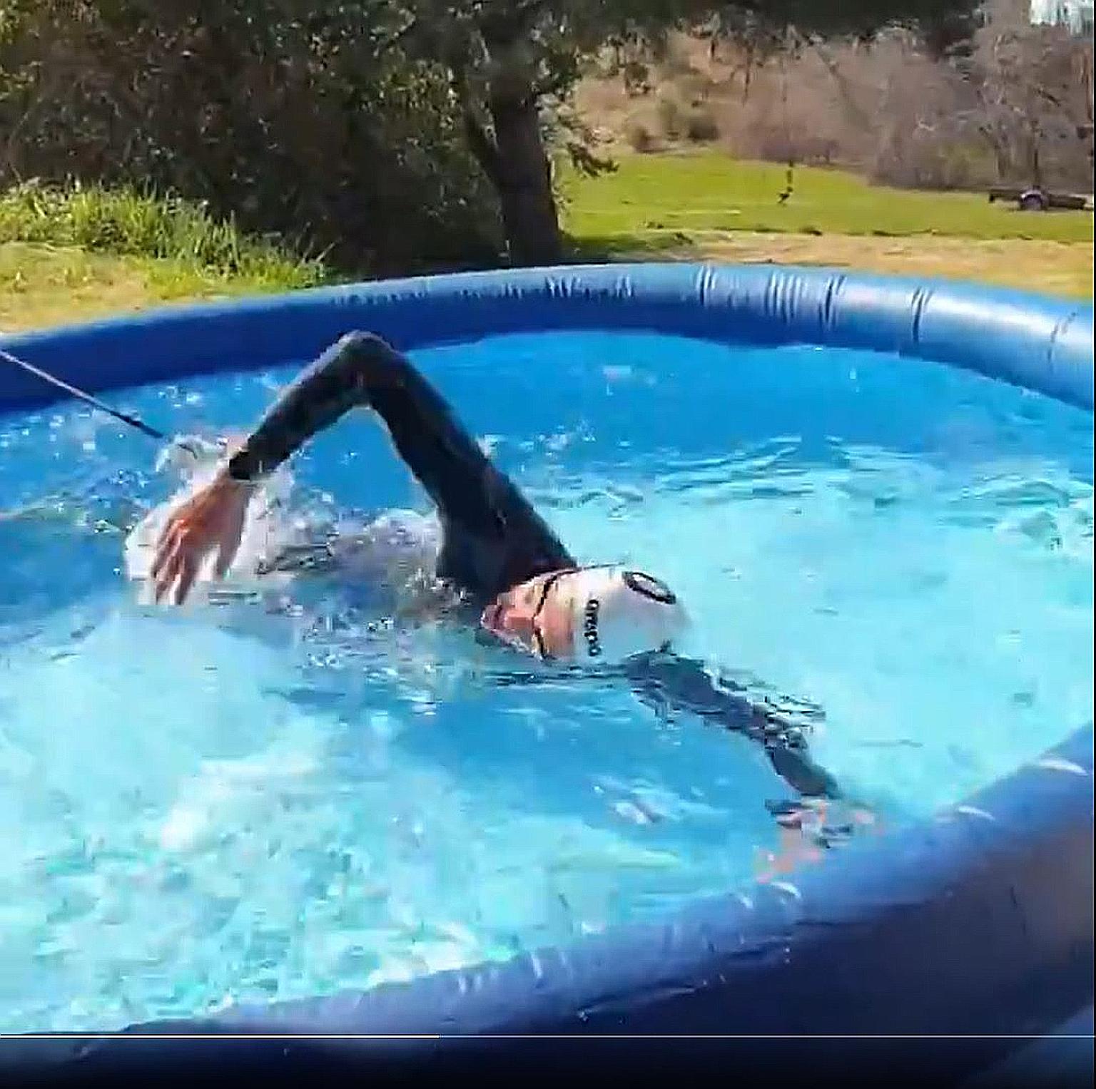 Dutchwoman Sharon van Rouwendaal set up an inflatable pool with a bungee cord to train during the lockdown.