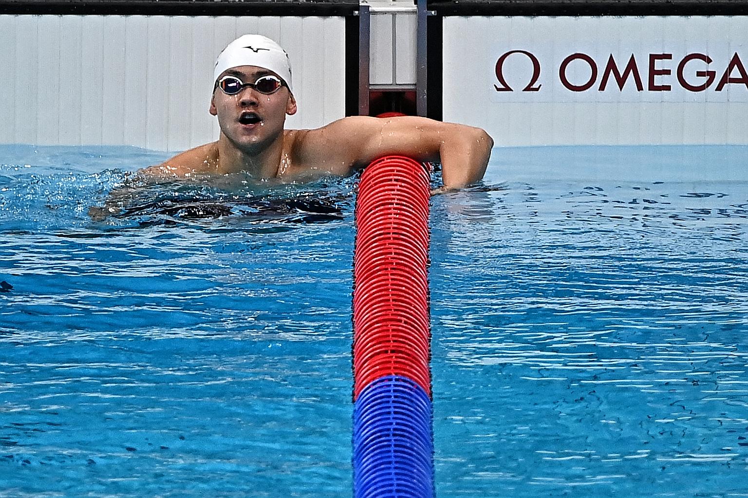 Singapore's Joseph Schooling reacts after finishing last in his 100m butterfly heat in 53.12sec last night. The 2016 Olympic champion's campaign in Tokyo has ended after failing to qualify for the semi-finals.