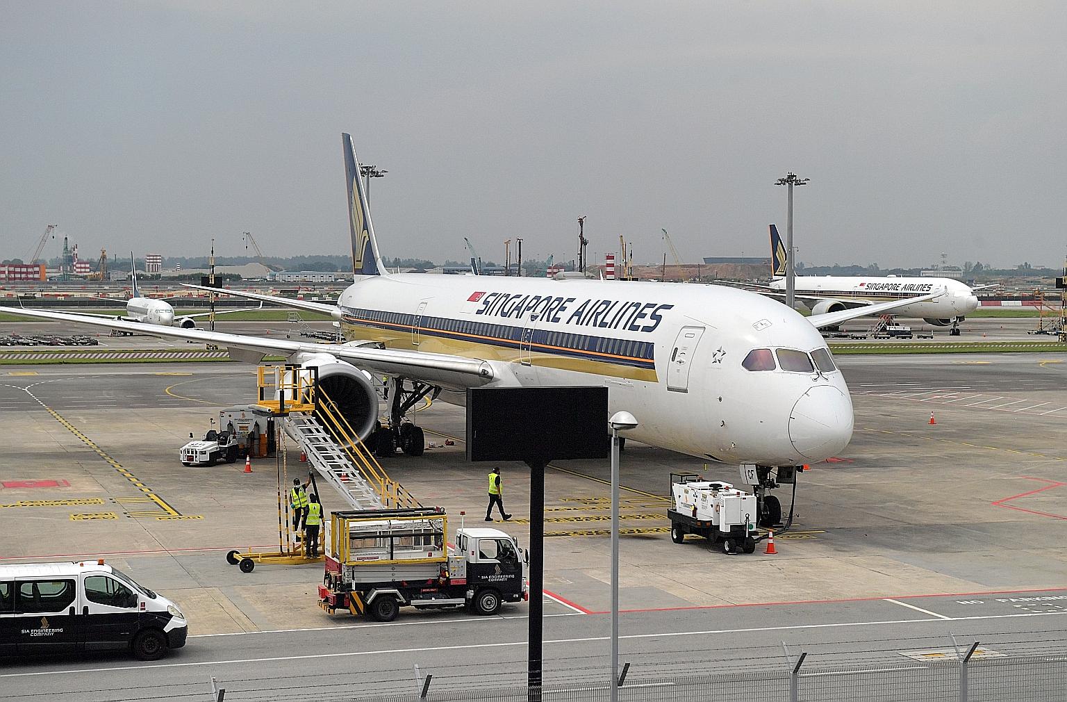 Singapore Airlines jets at Changi Airport. The company said its strong balance sheet and access to liquidity enabled it to position itself for growth as the aviation sector recovers from the impact of the pandemic.