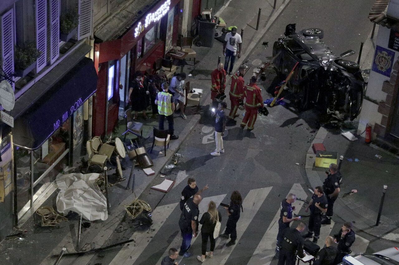 Police seal off Paris street after car crashes into cafe | The Straits ...