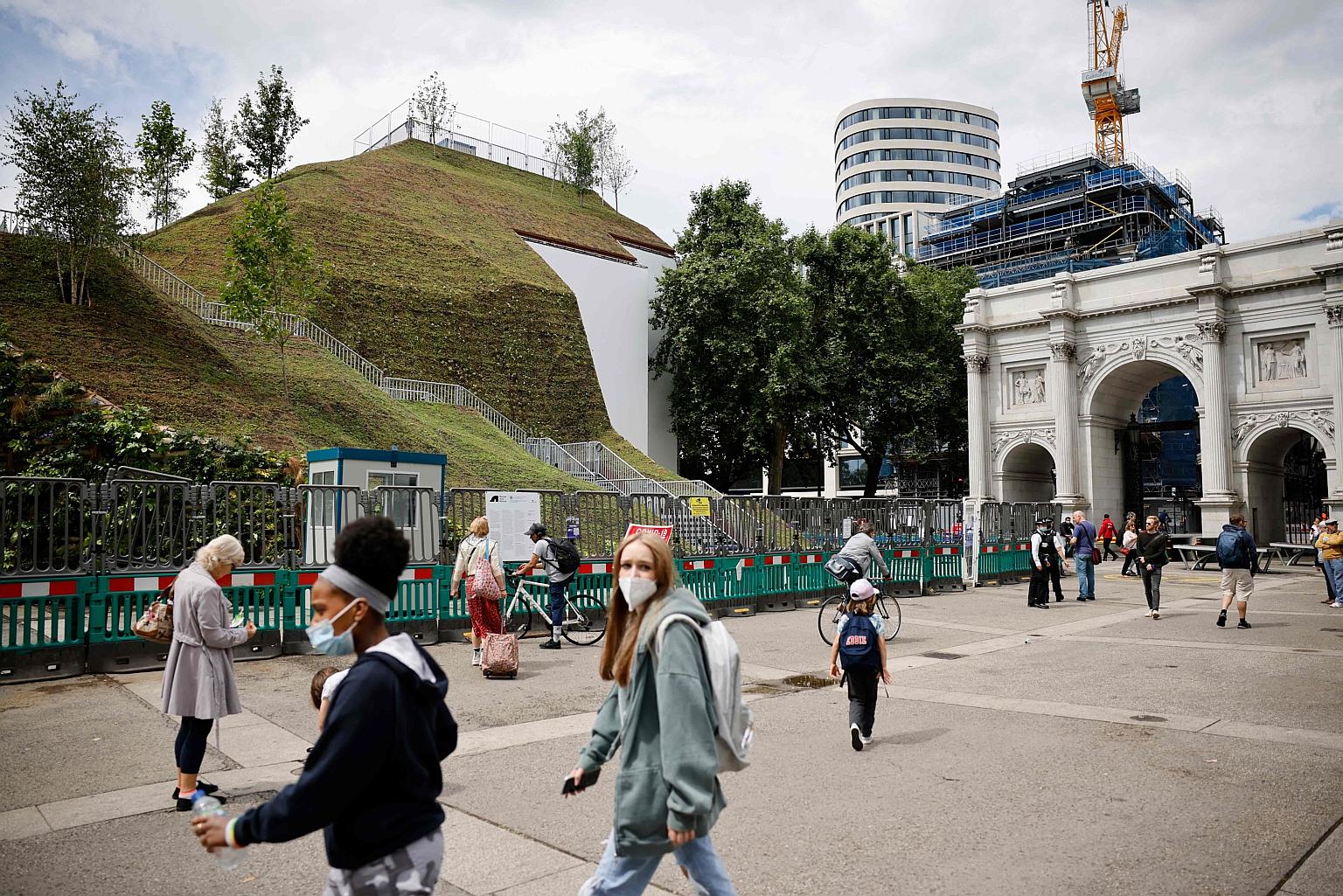 The grassy Marble Arch Mound, which is taller than the original Marble Arch, has disappointed many visitors to the site.