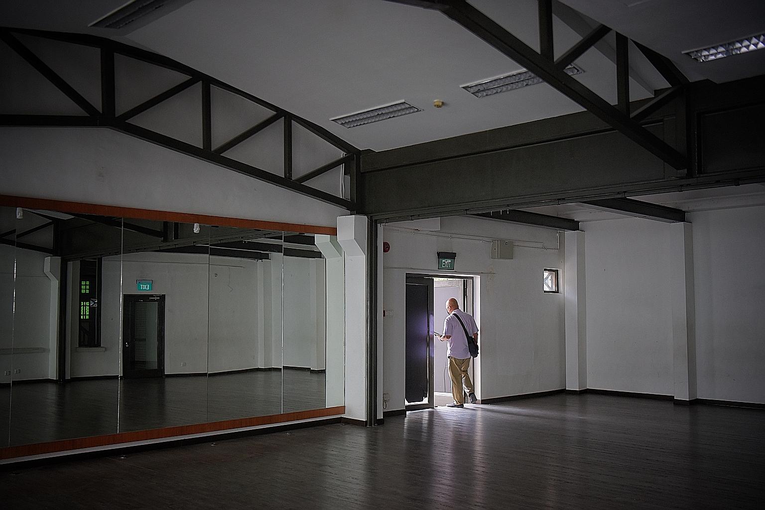 Mr Aikes Loh, general manager of The Substation, leaving after inspecting the dance studio at the arts venue for the final time yesterday. An eight-member resource panel will inform what the building at 45 Armenian Street will become after its renova