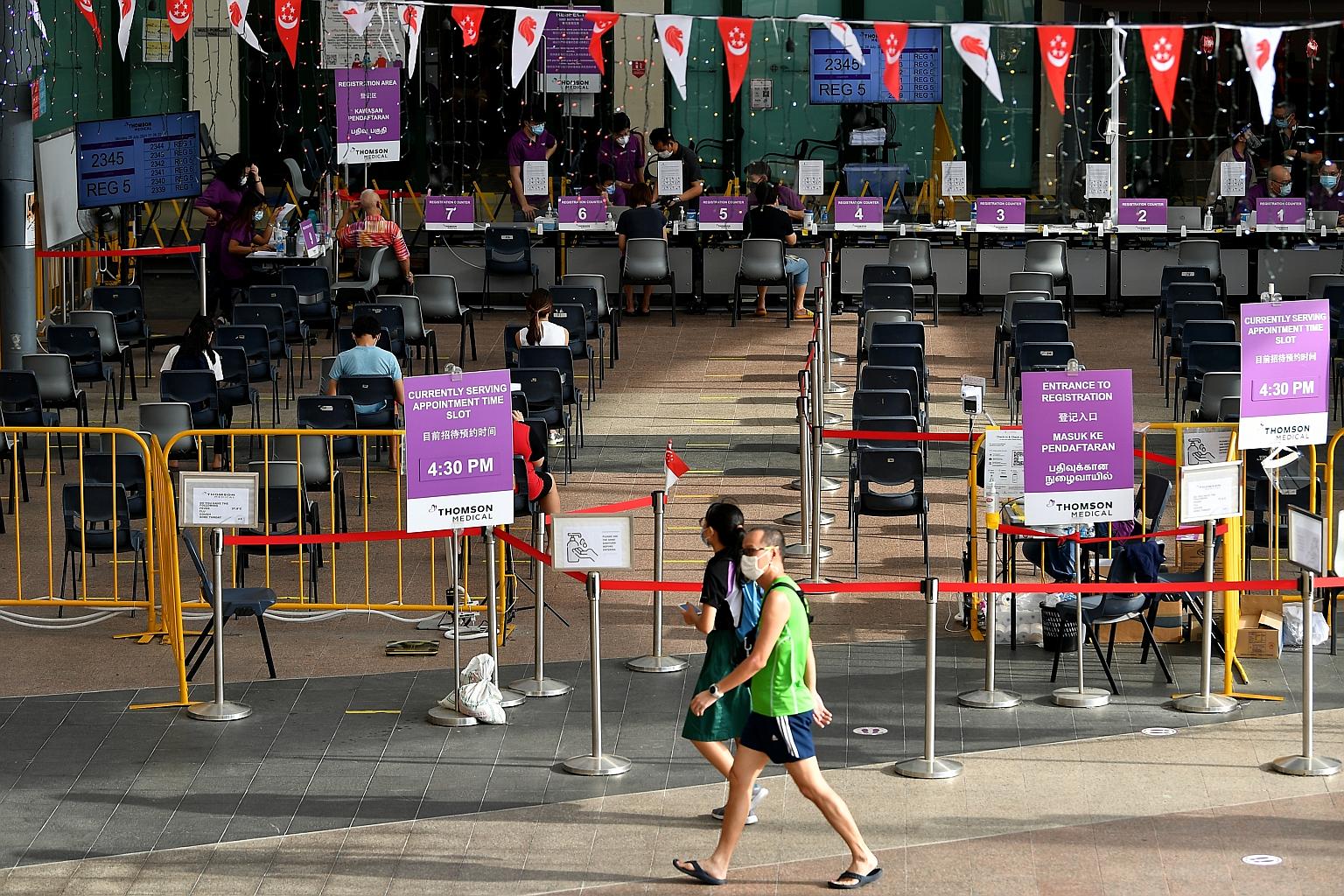 People going for Covid-19 vaccination at Bishan Community Club vaccination centre late last month. Associate Professor Alex Cook said he was particularly worried that the unvaccinated elderly think that because they do not go out much, they will not