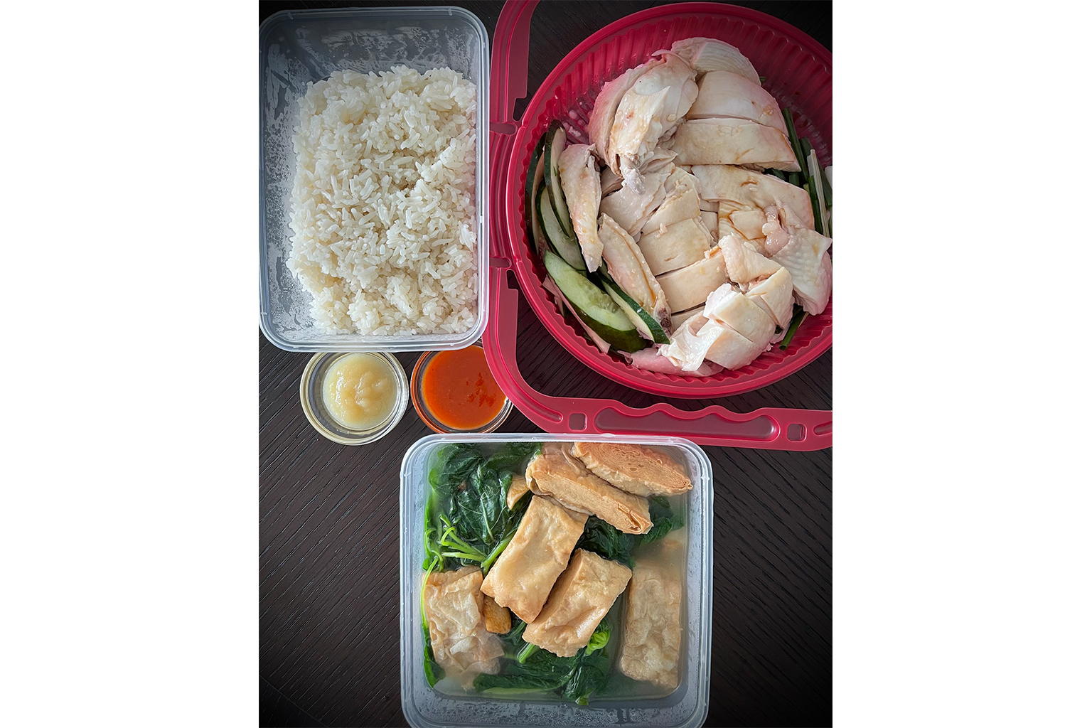 Signature Boiled Chicken (Half), rice and Poached Chinese Spinach With Gluten & Garlic.