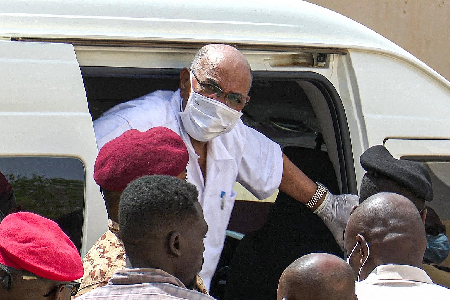 Sudan's ousted President Omar al-Bashir arriving at the courthouse in the capital Khartoum in July last year. He has been wanted by the International Criminal Court for more than a decade over charges of genocide, war crimes and crimes against humani