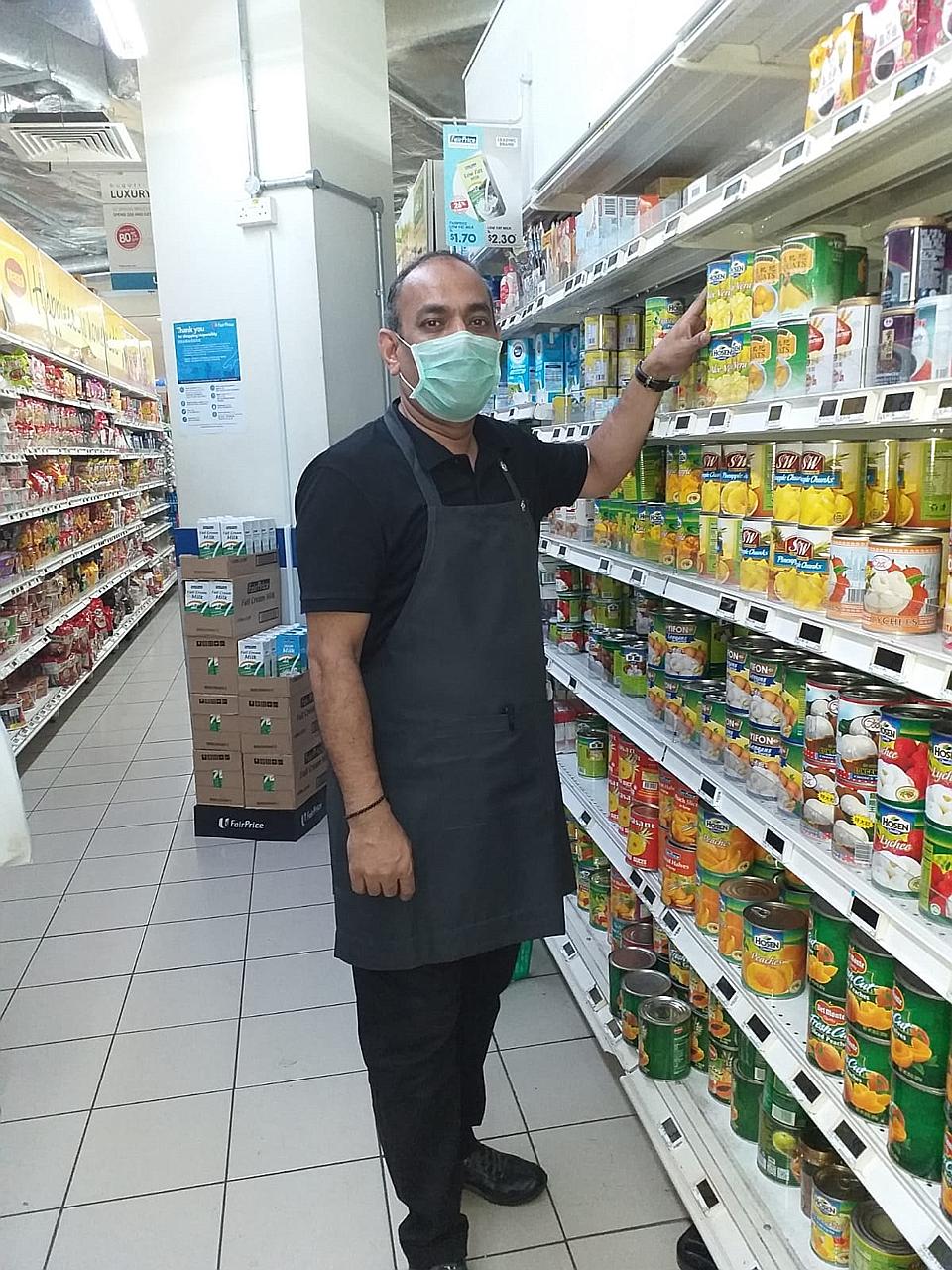 Mr Akbar Khan Omar Khan, 48, who had been working as a butler for high-priority guests at Grand Hyatt hotel, took up an offer last year to be seconded to another company to work in an essential role. He was redeployed to a FairPrice outlet to work as