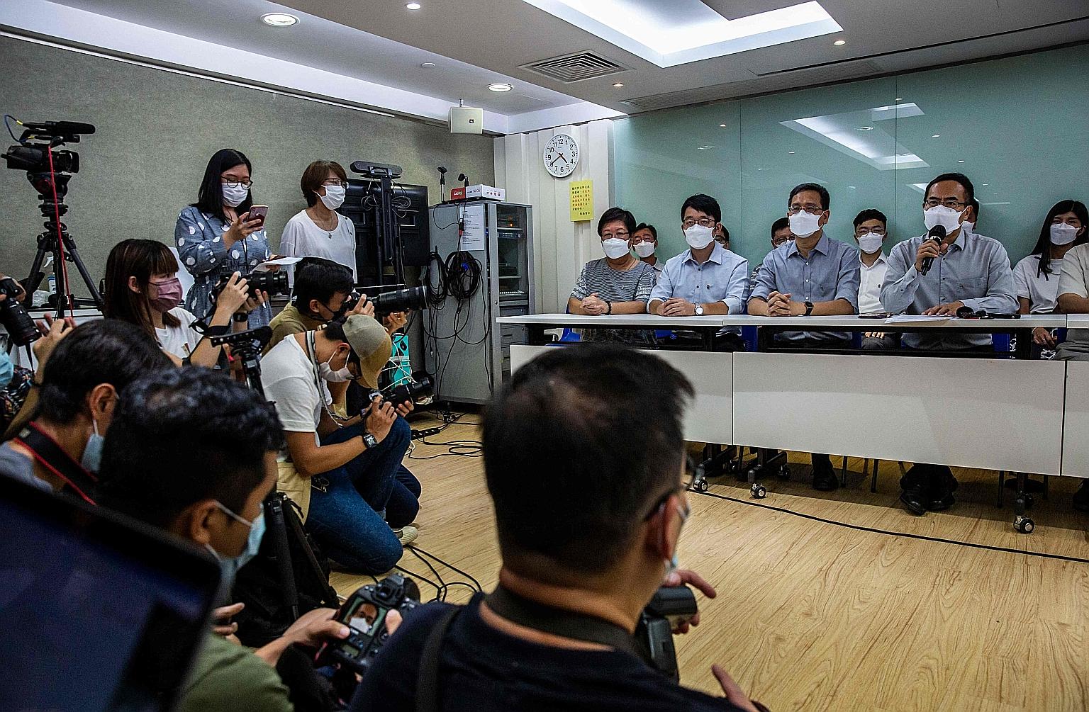 Professional Teachers' Union president Fung Wai-wah speaking at a press conference in Hong Kong on Tuesday to announce the union's decision to disband.