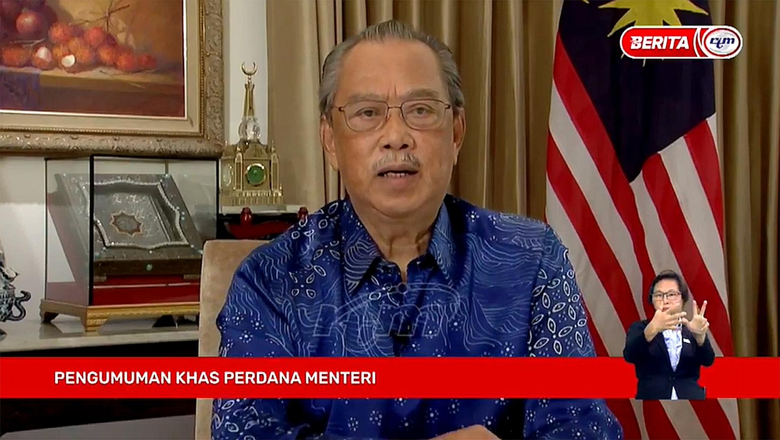 Malaysian Prime Minister Muhyiddin Yassin addressing the nation yesterday. Tan Sri Muhyiddin promised to hold a general election by end-July next year, and said the opposition leader will be given all perks akin to a senior minister's rank. The Pakat