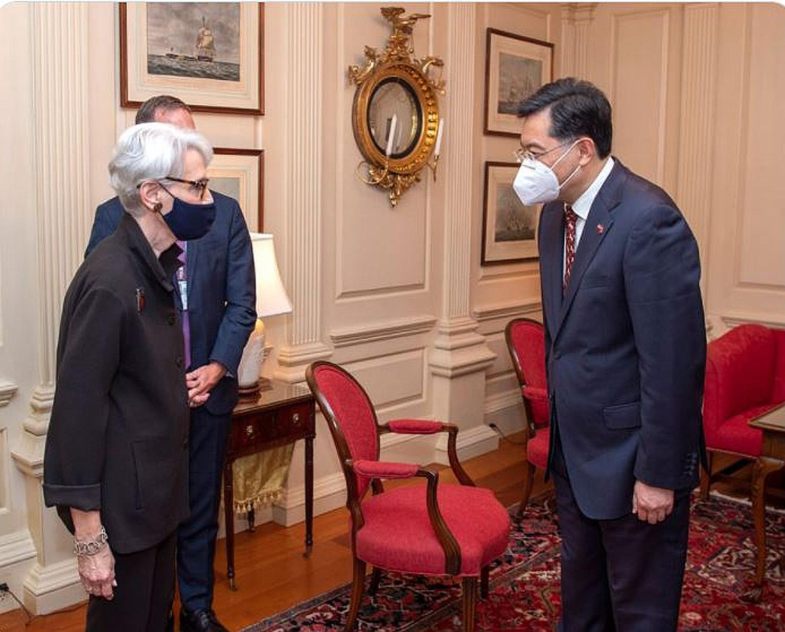 China's newly appointed ambassador to the US, Mr Qin Gang, meeting US Deputy Secretary of State Wendy Sherman in Washington on Thursday. PHOTO: WENDY R. SHERMAN/ TWITTER
