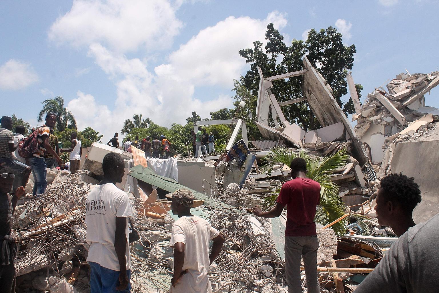 The rubble of a hotel in the Haitian commune of Les Cayes after the 7.2-magnitude quake struck at the weekend. The US and other nations have swiftly pledged support for crisis-ridden Haiti, with US President Joe Biden approving "immediate" aid effort