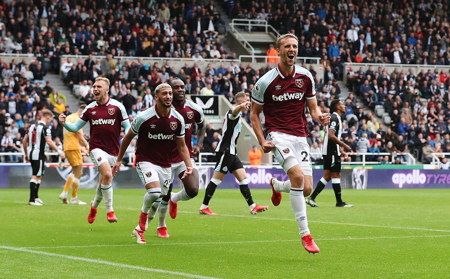 A jubilant Tomas Soucek celebrating after putting West Ham 3-2 ahead against Newcastle at St James' Park yesterday. The Hammers went on to win the Premier League clash 4-2.