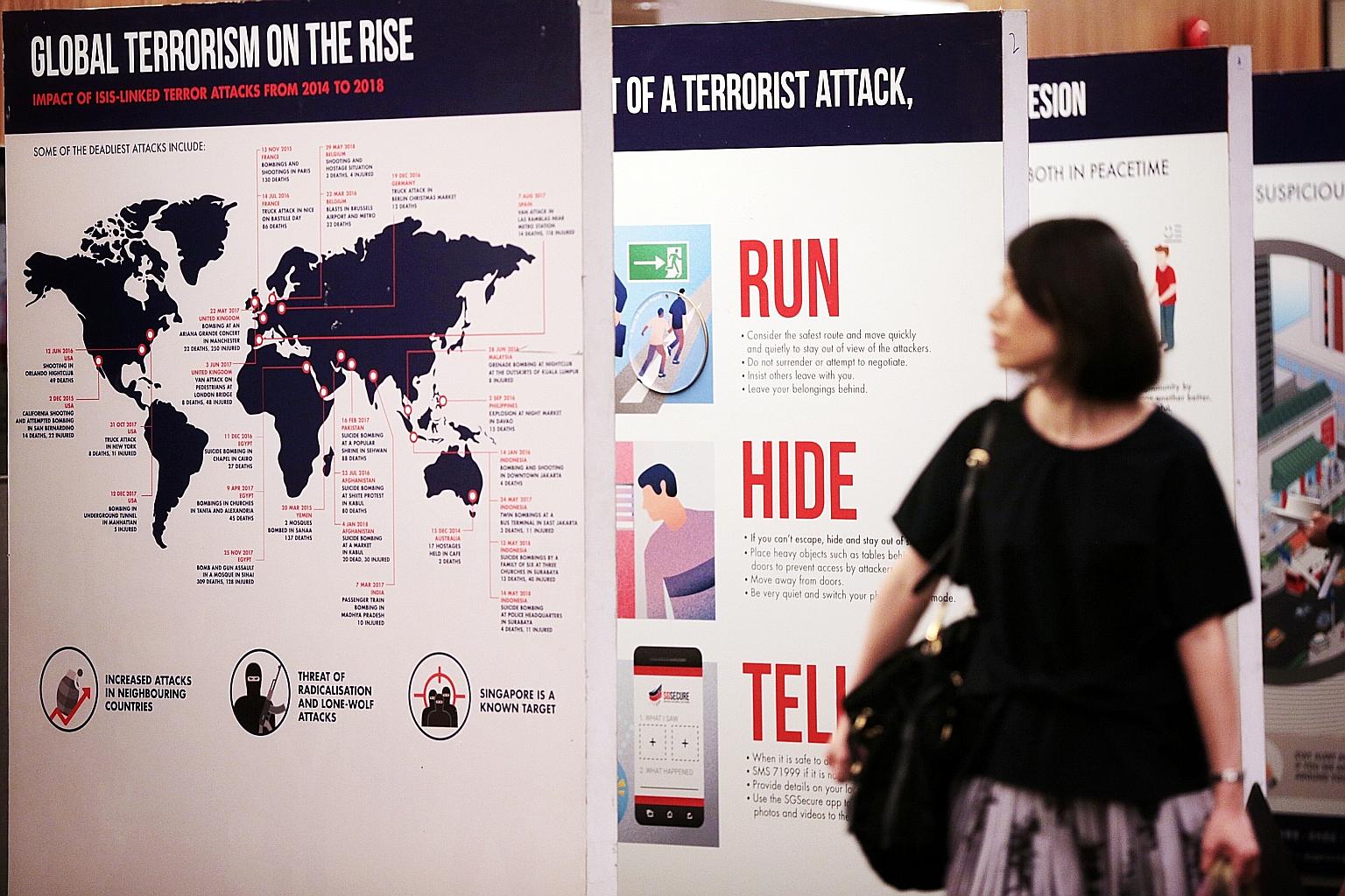 The writer says we should join the fight against terror by taking part in the SGSecure movement, and becoming familiar with the "Run, Hide, Tell" response model for when an attack happens. ST PHOTO: JASON QUAH