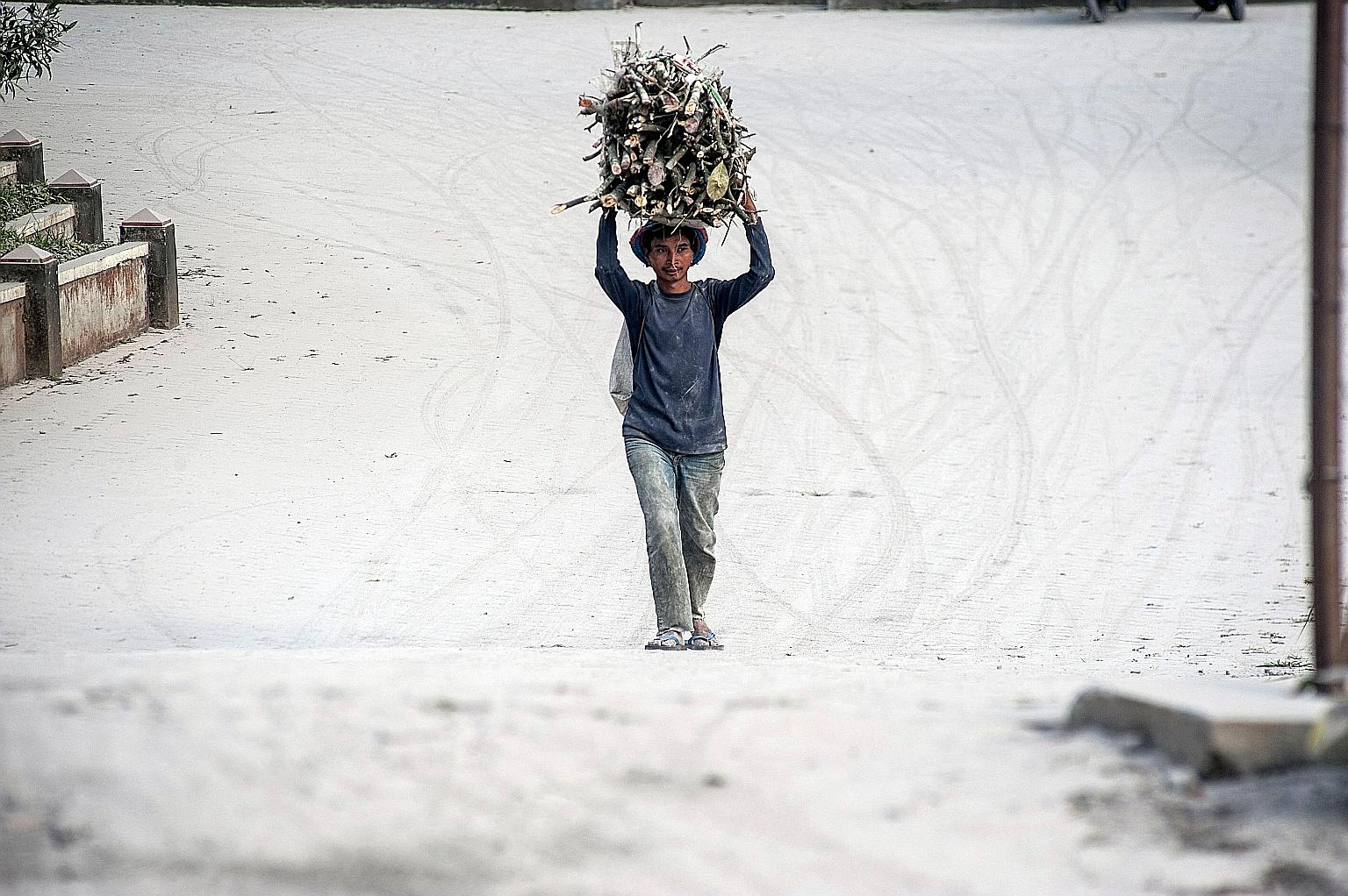 A path strewn with volcanic ash from the eruption of Mount Merapi, Indonesia's most active volcano, in Magelang near Yogyakarta yesterday.
