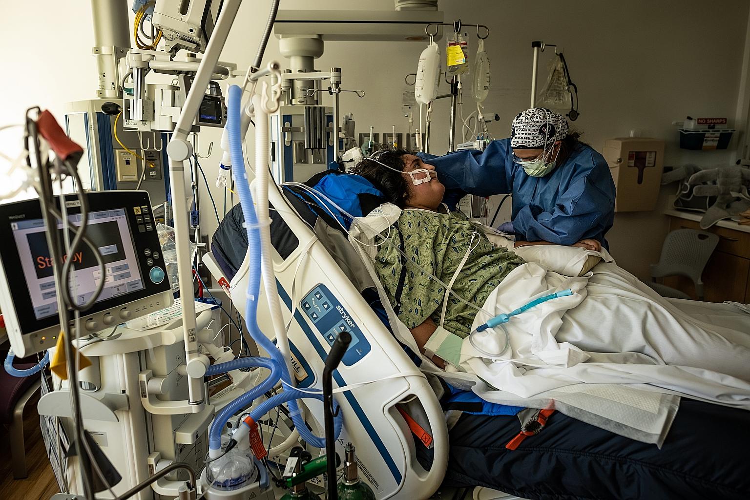 A 14-year-old Covid-19 patient at the Children's Hospital of San Antonio in Texas earlier this month. From Aug 5 to 11, 263 children were admitted to hospitals in the US every day, on average, data shows.