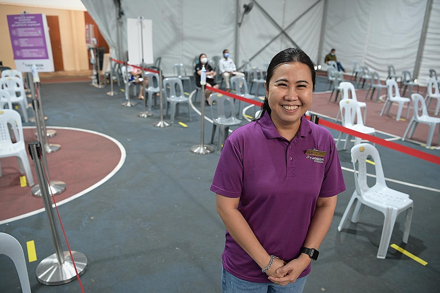 Ms Joey Yap used to run fine-dining establishments before Covid-19 struck. Now, she taps her experience in managing staff and handling administrative duties to oversee operations at the Potong Pasir Community Club vaccination centre.
