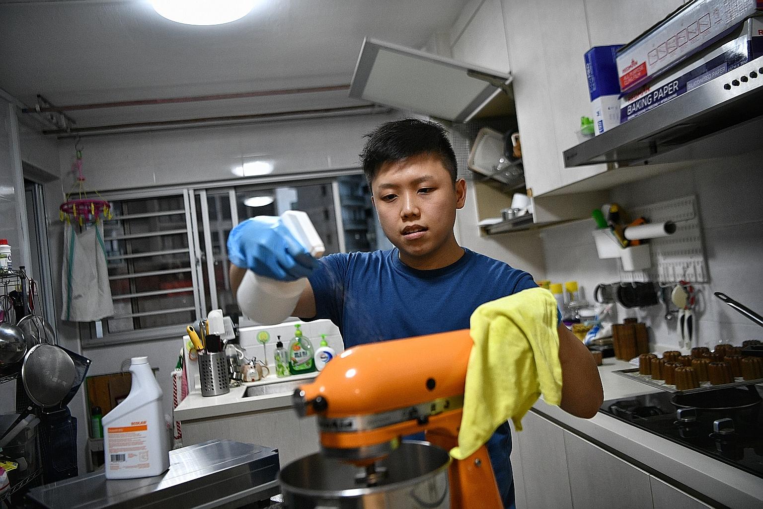 Mr Xavier Lee of Flourcrafts, seen here in his home kitchen, says licensing would "take away the fluidity and ease of entry for most people", and that regulations and restrictions are a quick but short-term solution.