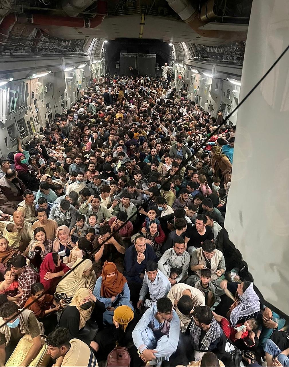 Around 640 Afghans crammed into a United States military transport aircraft departing Kabul for Qatar on Sunday, as Taleban militants advanced into the Afghan capital and President Ashraf Ghani fled. Videos and photos have circulated widely online sh
