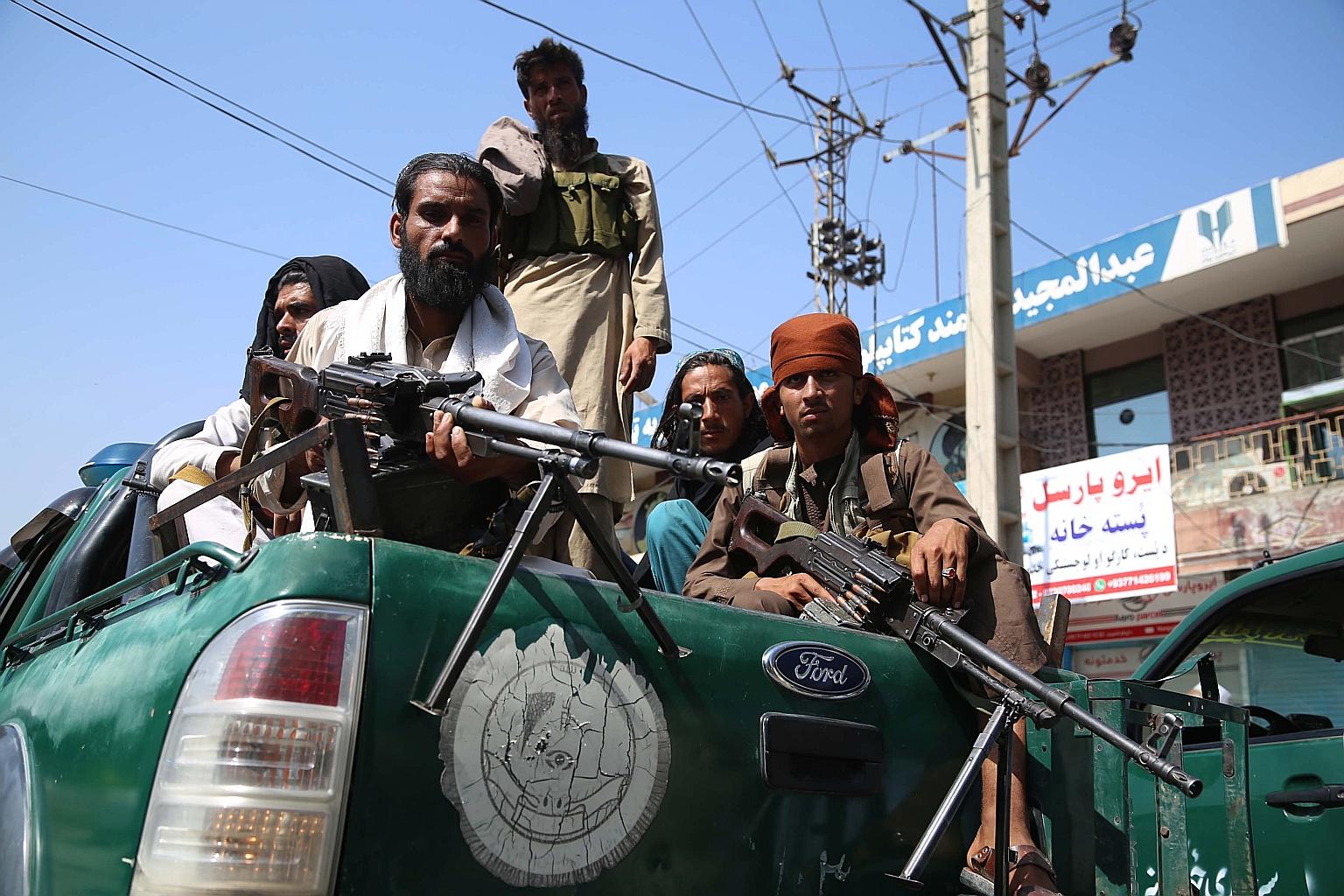 Taleban fighters patrolling yesterday in Jalalabad, capital of the eastern Nangarhar province. The comments by Russia's ambassador to Afghanistan Dmitry Zhirnov this week reflect an undisguised effort by Moscow to deepen its ties with the Taleban whi