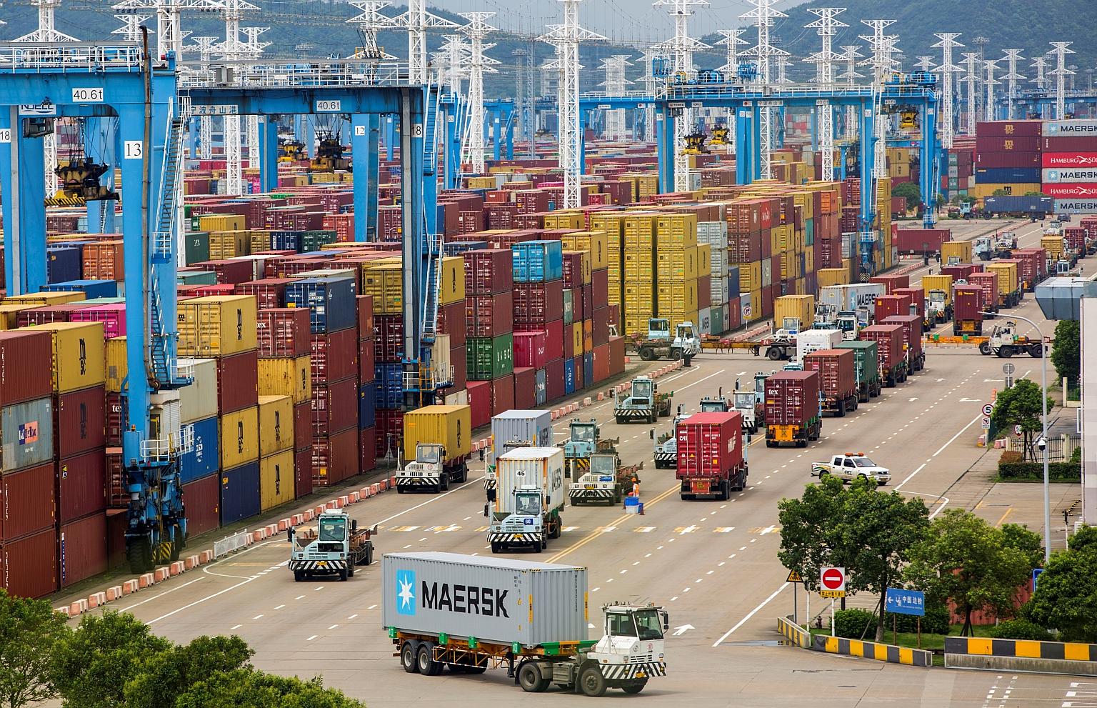 A container terminal at Ningbo port in Zhejiang province. Over 50 container vessels were queueing on Tuesday at Ningbo port - China's second-largest marine centre - up from 28 on Aug 10 when a Covid-19 case was reported at one of its terminals, accor