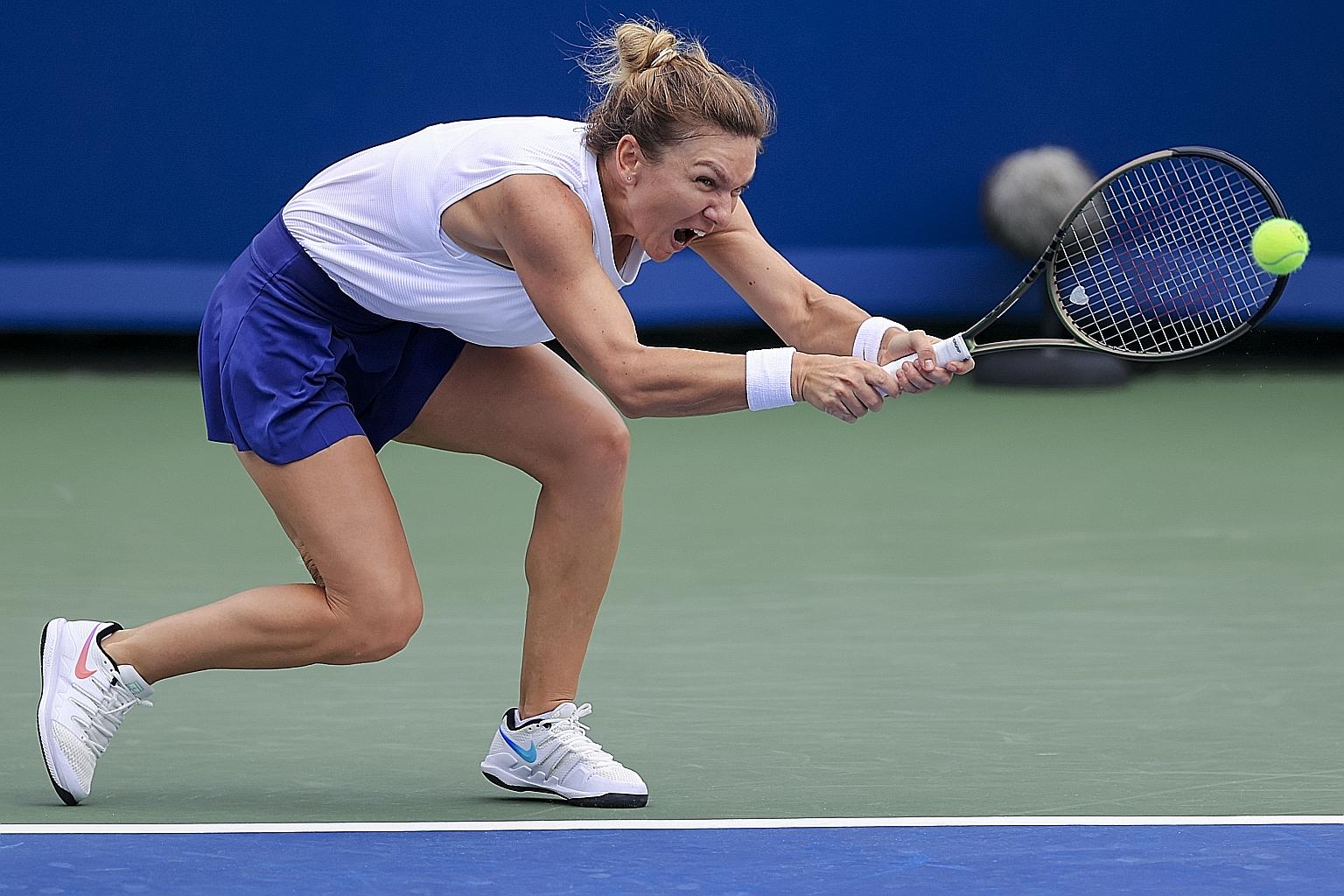 Romania's Simona Halep returning a shot en route to beating Magda Linette of Poland 6-4, 3-6, 6-1 at the Cincinnati Masters on Tuesday.