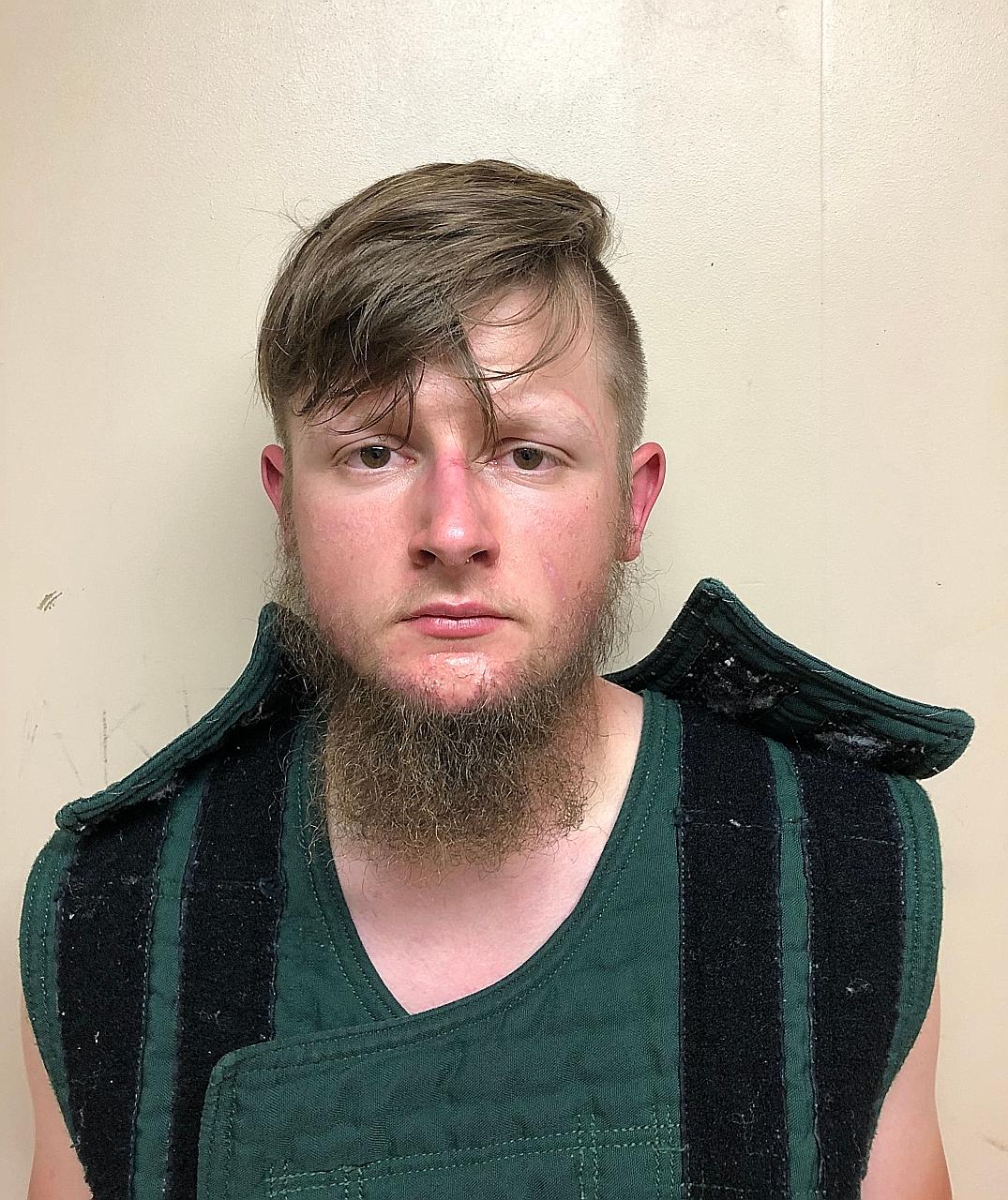 Robert Aaron Long, 22, faces more charges in the killings of four more women at spas in Atlanta, Georgia, where the district attorney has said she believed the women were targeted because of their race and gender.