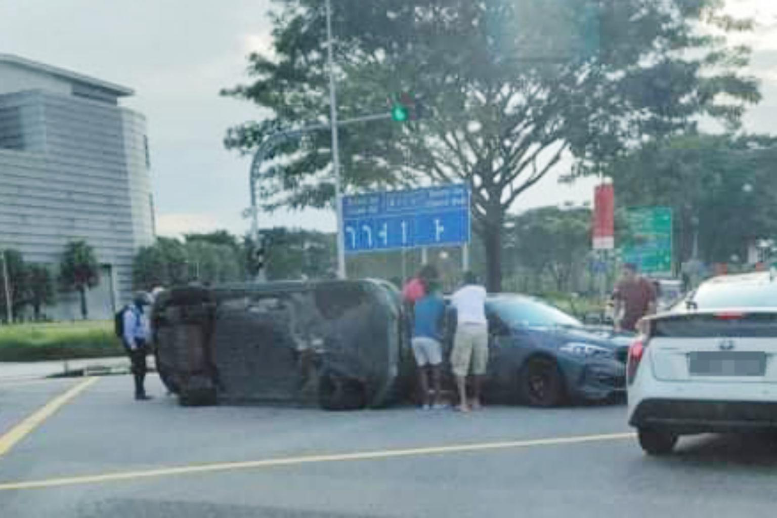 Two men taken to hospital after three-vehicle collision near Marina Bay ...