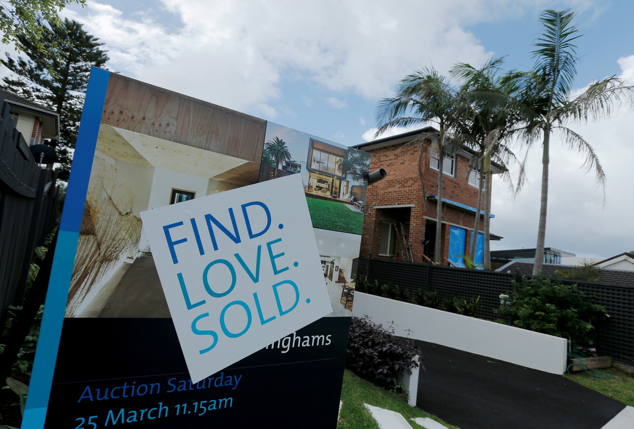 <p>FILE PHOTO: A for-sale sign indicates a residential property sold on the open market on the north shore suburbs of Sydney, Australia, April 4, 2017. REUTERS/Jason Reed/File Photo</p>