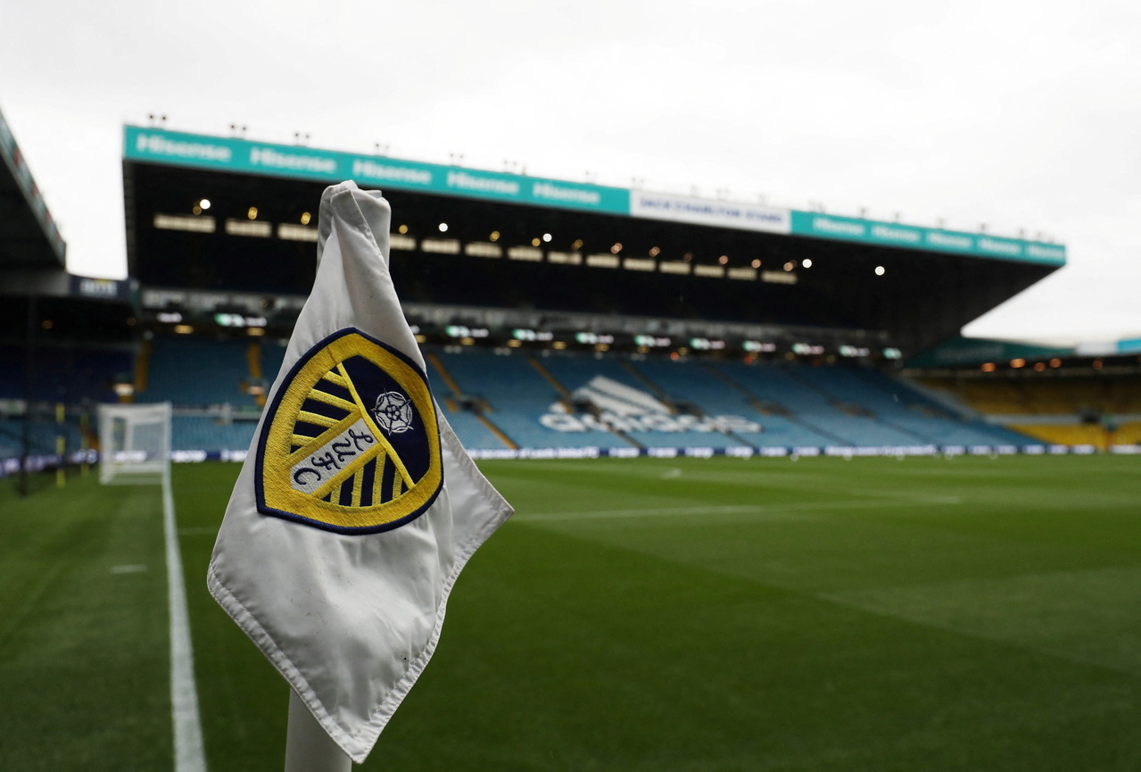 <p>FILE PHOTO: Soccer Football - Premier League - Leeds United v Watford - Elland Road, Leeds, Britain - October 2, 2021 General view of the Leeds United crest on a corner flag inside the stadium before the match REUTERS/Scott Heppell EDITORIAL USE ONLY. 