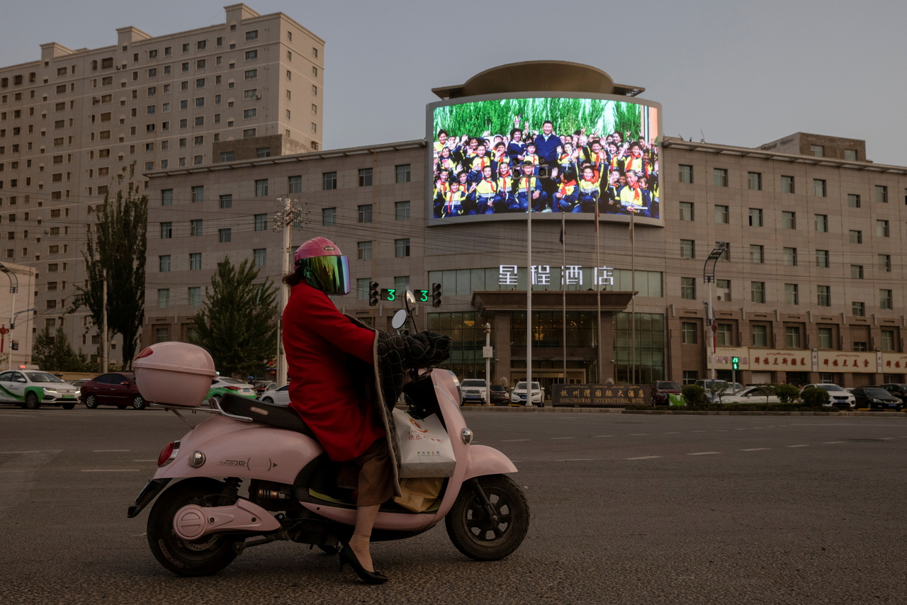 <p>A screen shows a picture of Chinese President Xi Jinping at a traffic junction in Hotan, Xinjiang Uyghur Autonomous Region, China, April 30, 2021. Picture taken April 30, 2021. REUTERS/Thomas Peter/File Photo     TPX IMAGES OF THE DAY SEARCH "GLOBAL PO