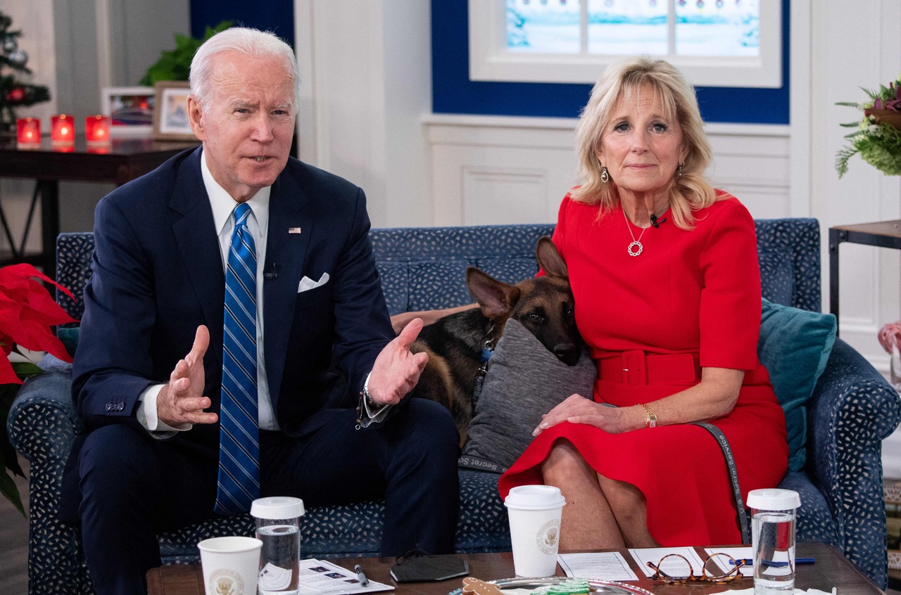 <p>US President Joe Biden and US First Lady Jill Biden, with their new dog Commander, speak virtually with military service members to thank them for their service and wish then a Merry Christmas, from the South Court Auditorium of the White House in Wash