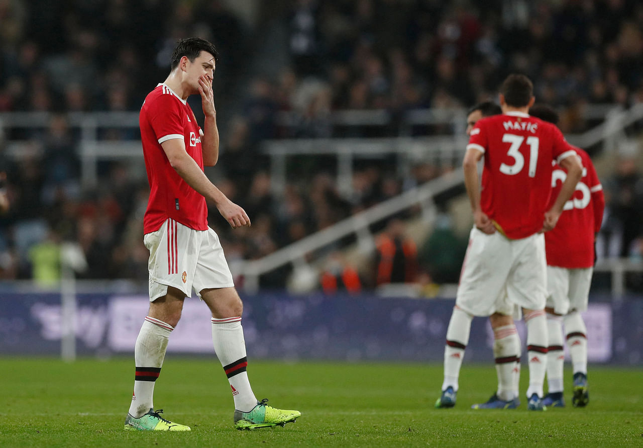 <p>Soccer Football - Premier League - Newcastle United v Manchester United - St James' Park, Newcastle, Britain - December 27, 2021Manchester United's Harry Maguire reacts after the match Action Images via Reuters/Lee Smith EDITORIAL USE ONLY. No use wit