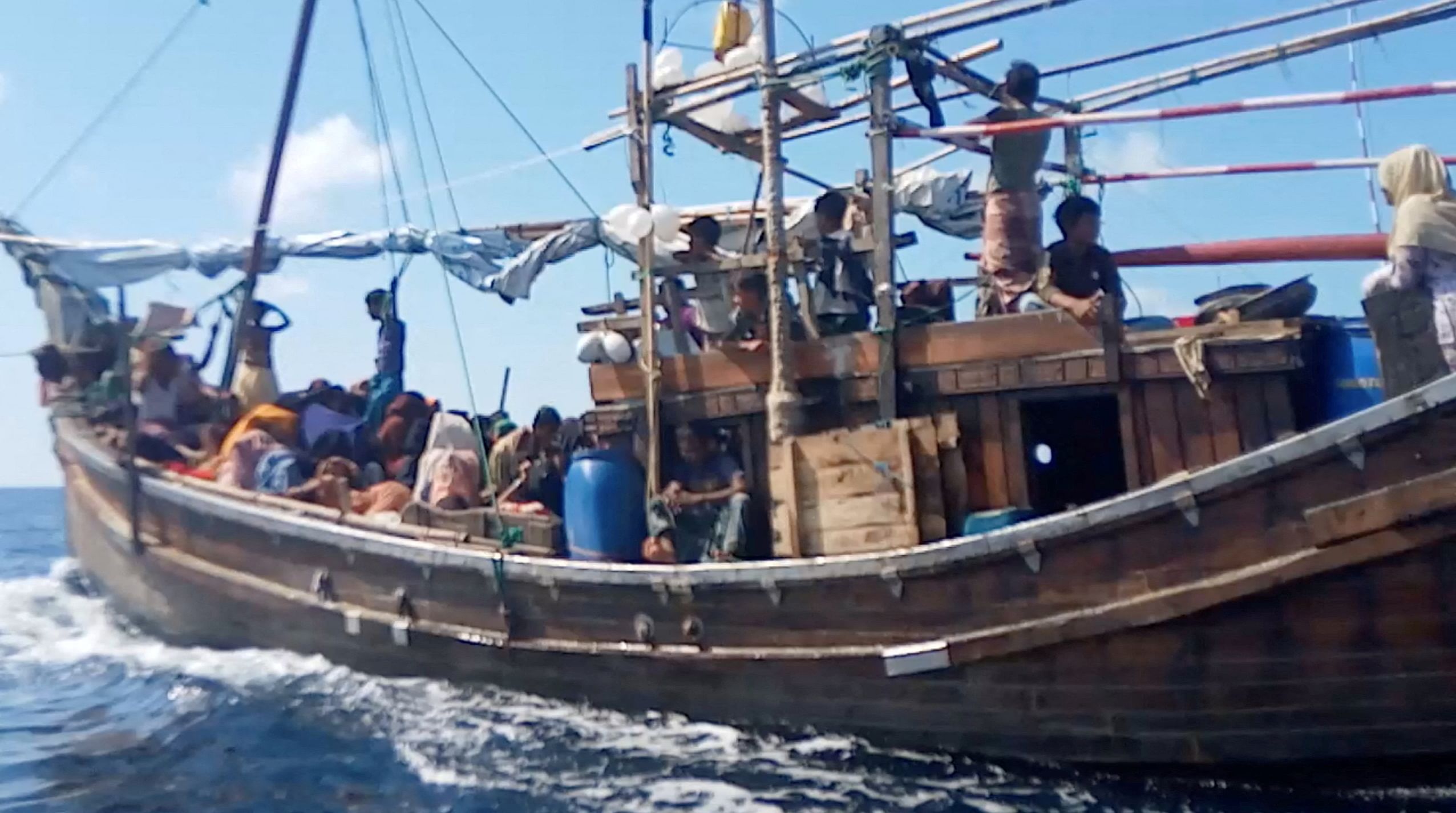 <p>A boat carries Rohingya people stranded at sea, Indonesia, December 27, 2021, in this still image obtained from a social media video. Aditya Setiawan/via REUTERS THIS IMAGE HAS BEEN SUPPLIED BY A THIRD PARTY. MANDATORY CREDIT.</p>
