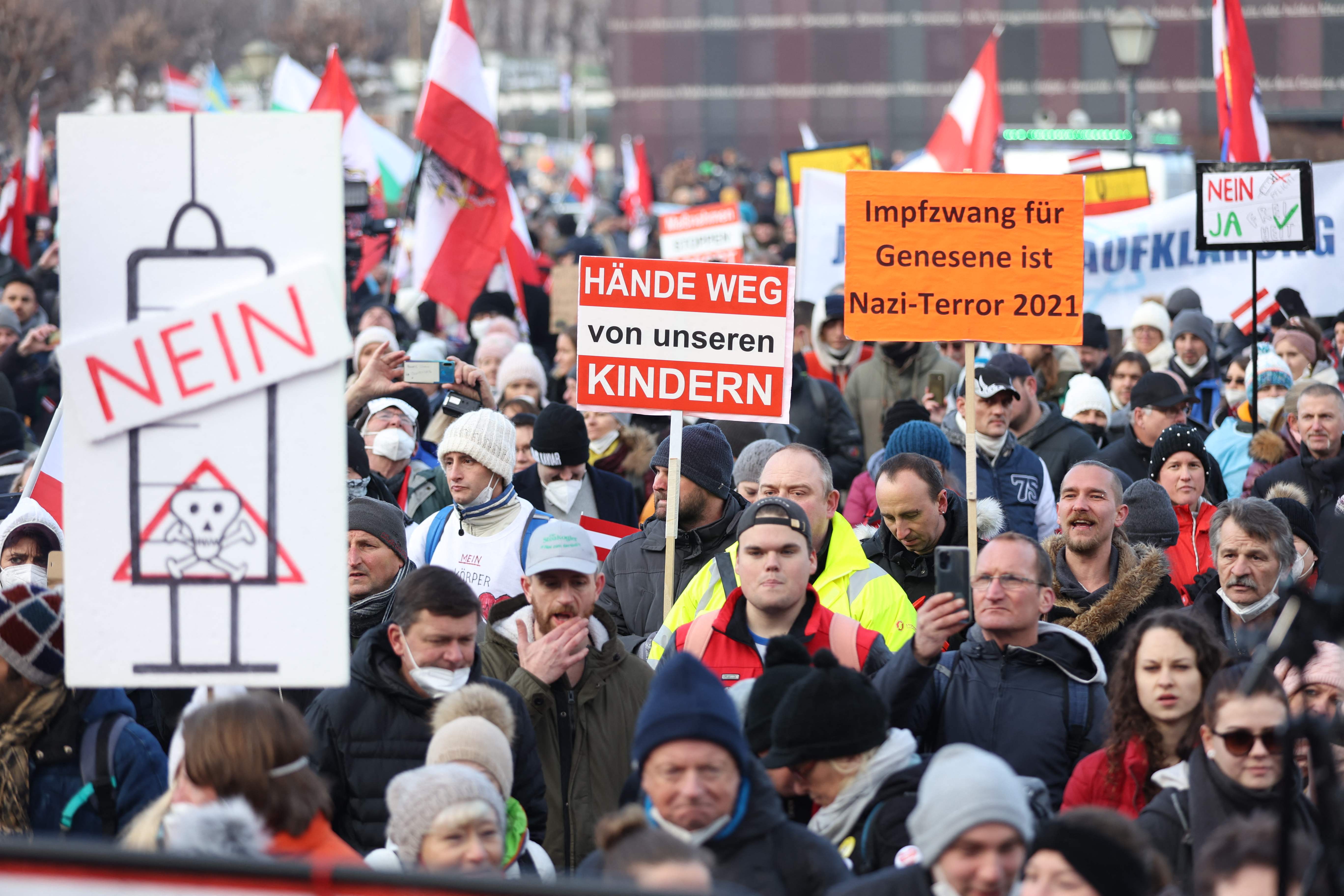 Covid-19 vaccine sceptics slammed across Europe as Omicron rages