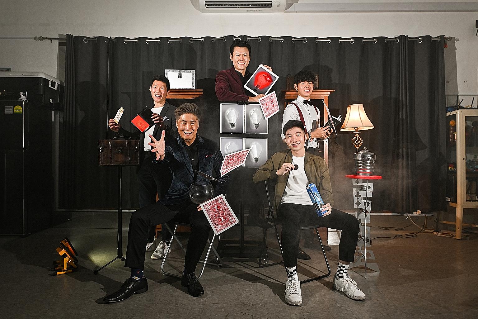 The House Of Curiosities show will feature five magicians - (clockwise from left, background) Mr Edward Loke, Mr Alexander Yuen, Mr Kenneth Kho, Mr Shon Tan and Mr Kai Emmanuel Kuah - with each having his own segment to present his tricks.