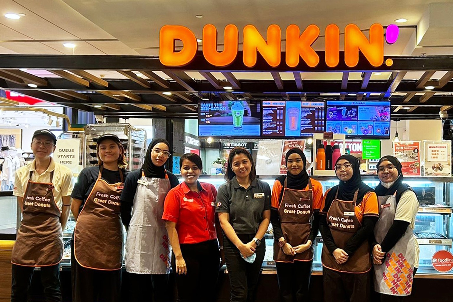 Curated visual reference: Picture Idea: Warm Smiles And Attentive Service How This Doughnut Chain Keeps