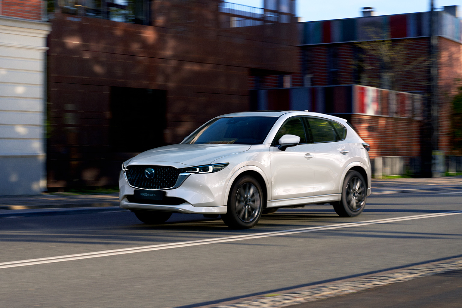 front view of mazda cx-5 m-hybrid car in white