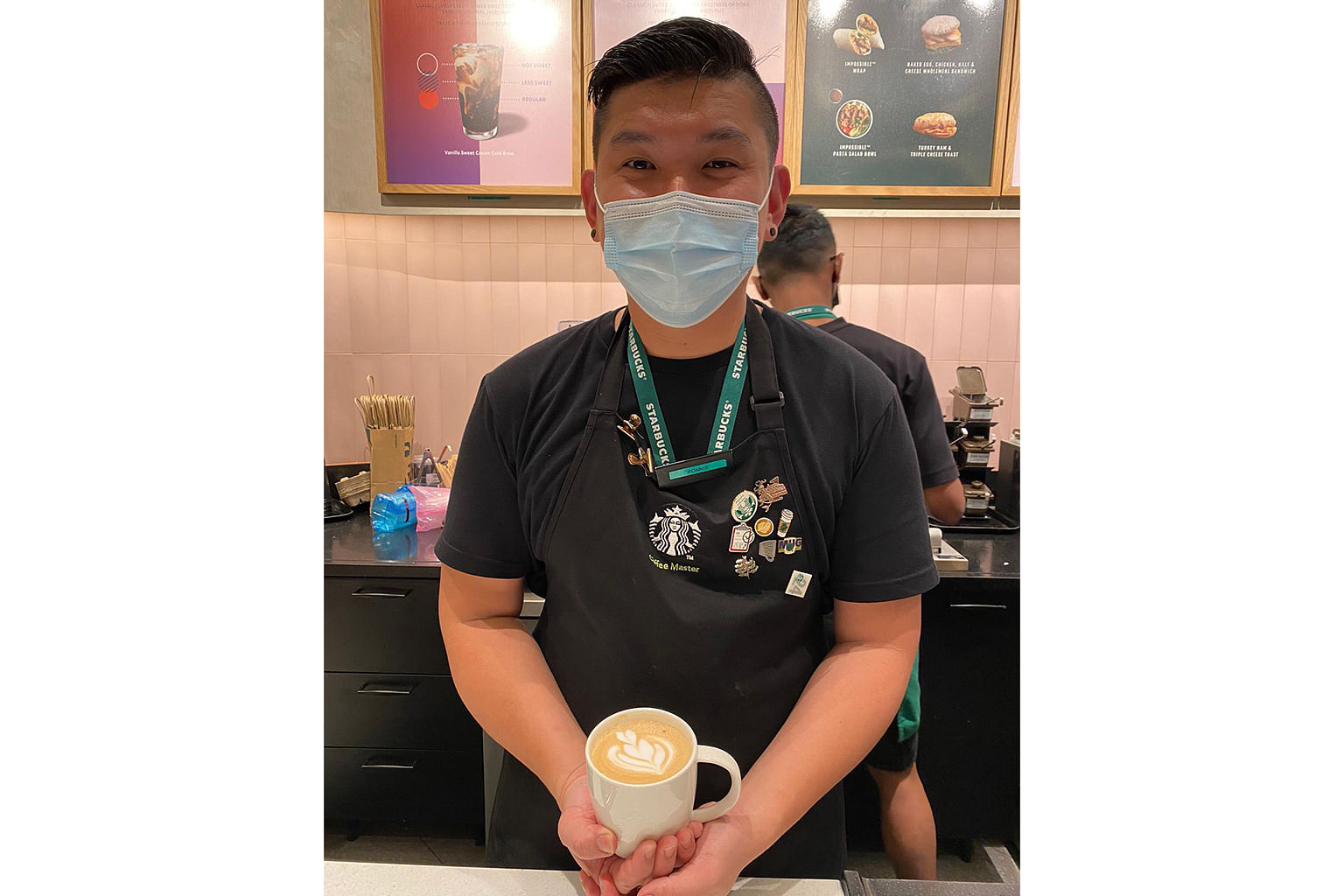 Ronnie Wong staff at Starbucks making coffee