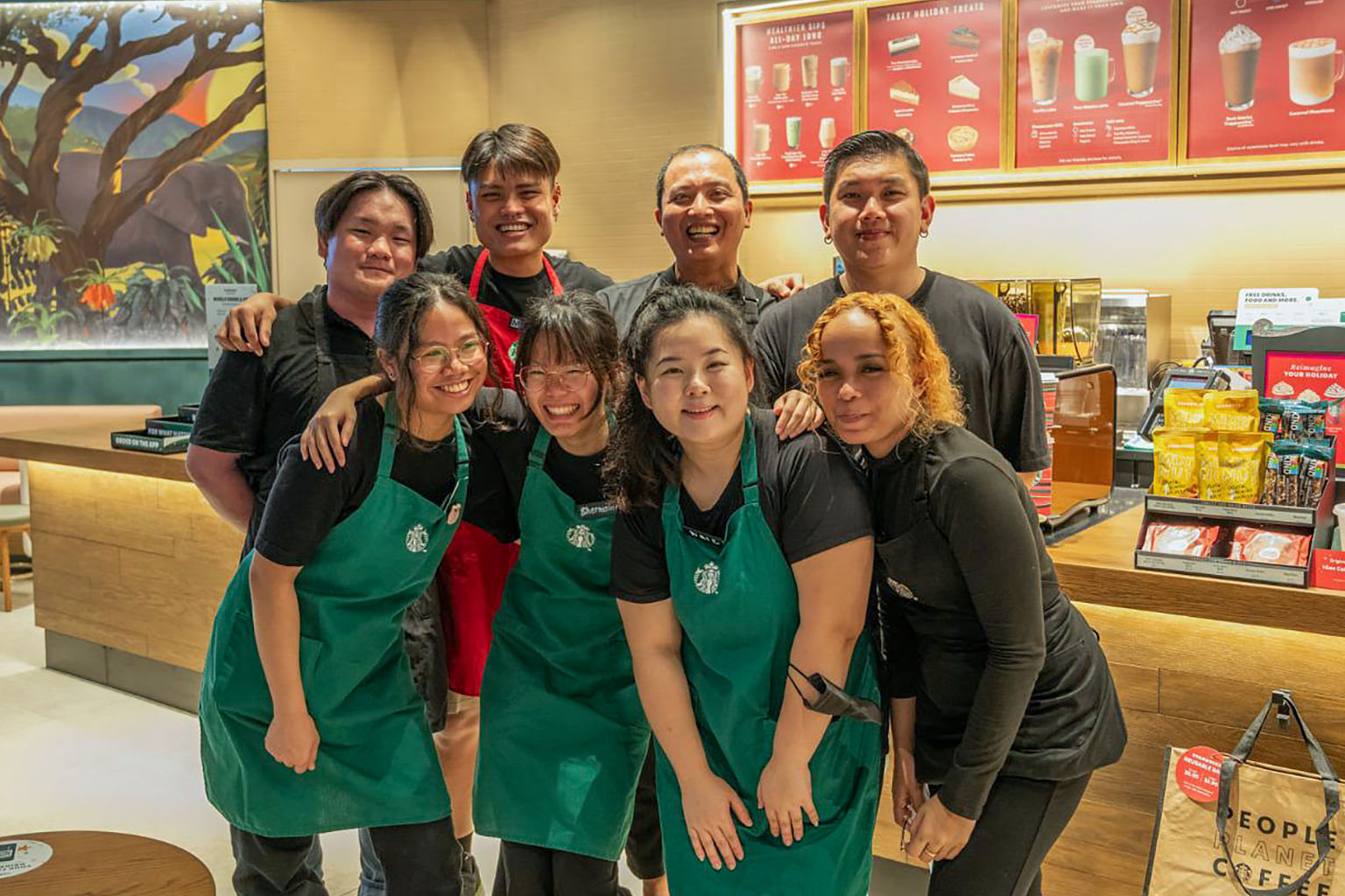 Ronnie Wong staff at Starbucks with his team