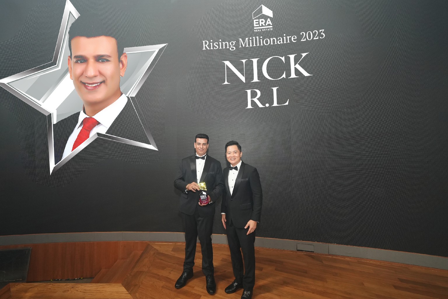 photo-of-era-property-agent-nick-rl-receiving-rising-millionaire-award