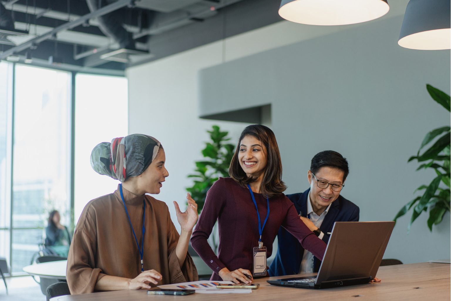 diverse group of employees at discussing at inclusive workplace