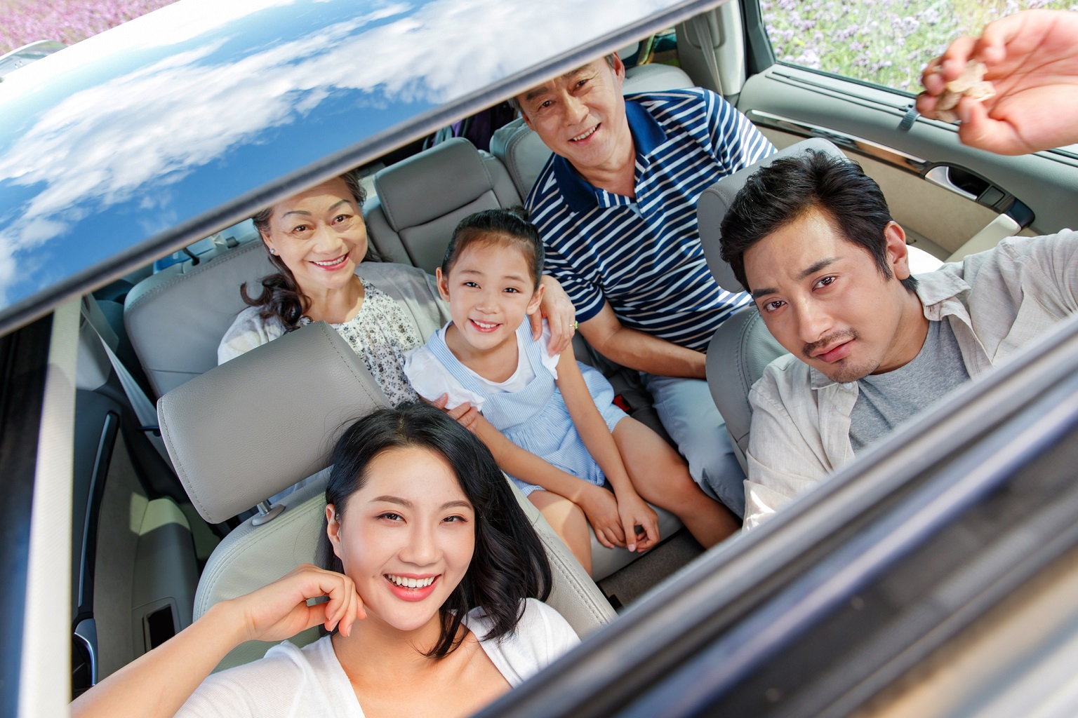 photo-of-three-gen-family-inside-car