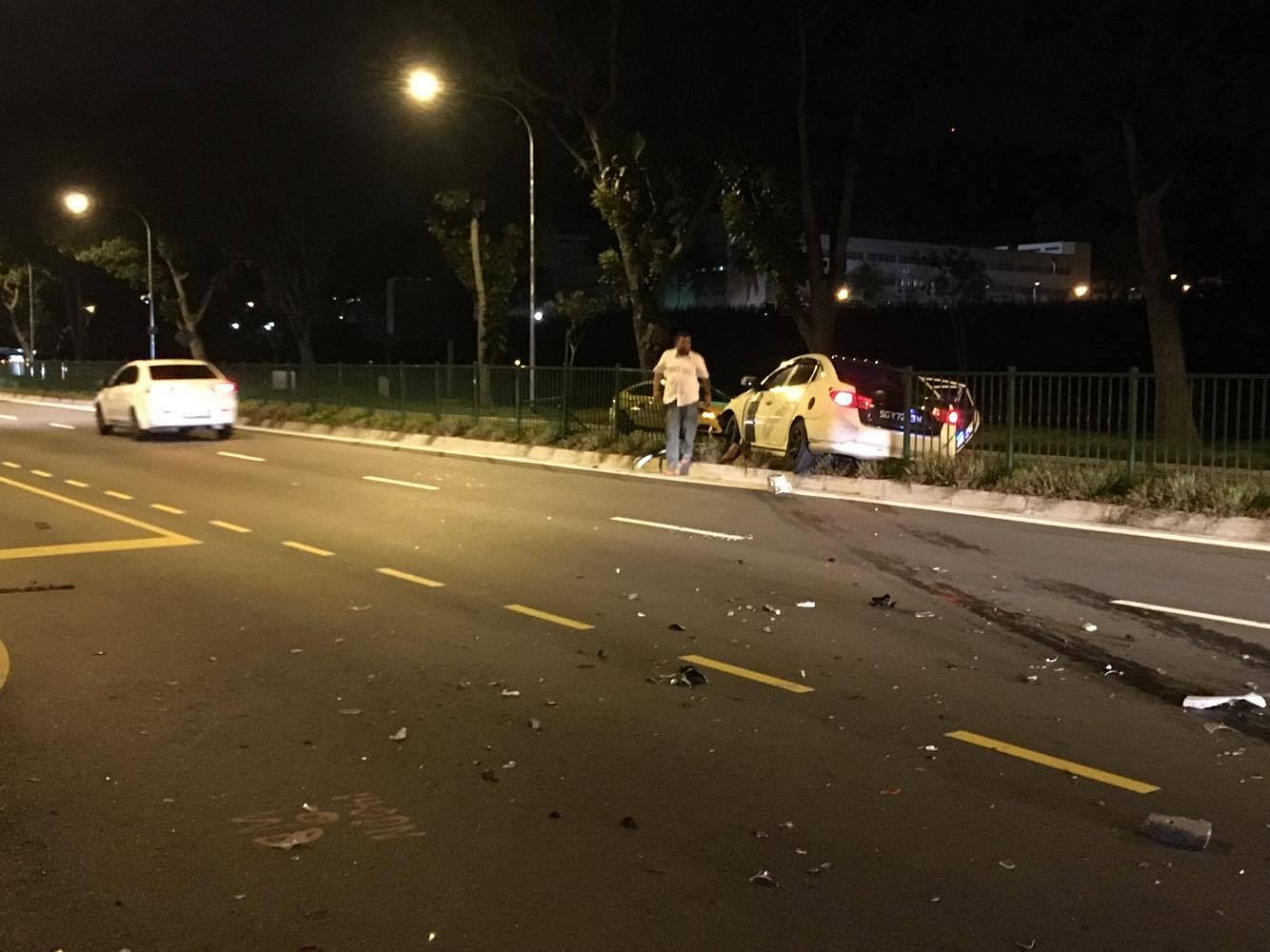 4 injured as car turns turtle after collision along Upper Bukit Timah ...