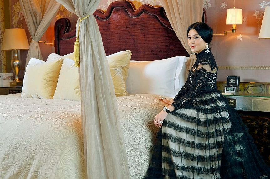 Mrs Sharel Ho on her Valentino gown: “This lace gown hints at sensuality and the high neckline makes it look so elegant. People tell me that I look like a princess when I wear it.” 